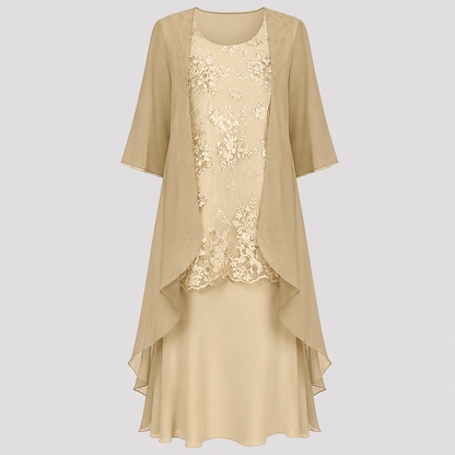 Detail of the 3/4 sleeves and round neckline on the Lumi dress